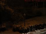 Headlights Approaching Darkened Stairs In Snow, Dell Court