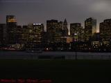 Boston Skyline In The Gloaming Of A Mostly Cloudy Evening