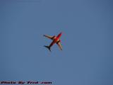 Jet Flying Overhead At Sunset, Chelsea, Massachusetts