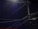 Snow Accumulating on Wires in Street Light, Lynn, Mass.