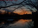 Sunset Reflecting on Broken Ice Cover, Charles River