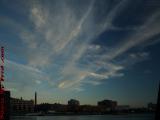 Crossed Clouds in Day's Last Light Over Fort Point Channel