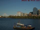 Hospital Arrival Beyond a Work Barge, Charles River