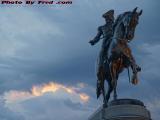 George Washington Monument Under Unsettled Sunset Sky