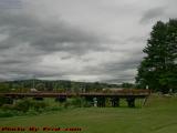 Pedestrian Walkbridge Under Heavy Skies, Island Park