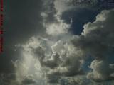 Beaming Sun Lighting Cloud Faces, Plantation, Florida